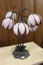 Tiffany style six arm table lamp with flower head glass shades, the metal base with lilly pad