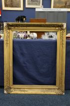 Antique gilt frame, the interior dimensions 75cm x 65cm, exterior 102cm x 87cm.