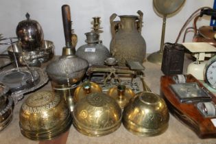 Brass ware to include postal scales, five Islamic dishes, and others, candlesticks, two Indian