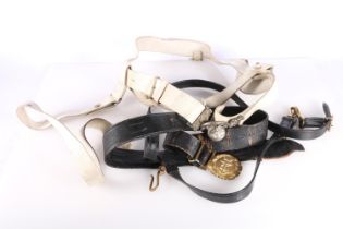 Naval gilded brass belt buckle on black leather belt and a white metal In Defence belt buckle on