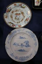 18th century tin glazed blue and white charger decorated with chinoiserie scene, 30cm diameter,