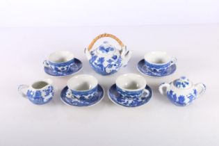 Chinese style miniature blue and white toy china tea service in original box.