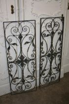 Two wrought iron fence panels, 106cm x 39cm.