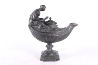 Wedgwood black basalt oil lamp in the form of an Aladdin lamp with figure reading surmount, 23cm