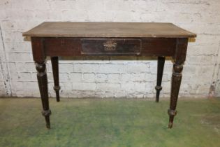 Victorian painted pine side table with frieze drawer, raised on turned supports, 115cm long.