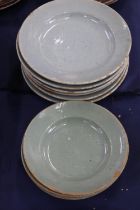 Celadon tin glazed earthenware dishes, 20cm and 17cm diameter.