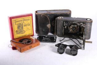 Kodak bellows camera in black leather case, a Thornton Pickard shutter in original cardboard box