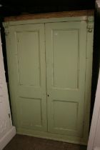 Victorian green painted two door cupboard, 207cm high.