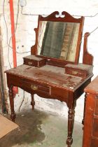 Edwardian mahogany dressing table, raised on turned supports, 91cm long.