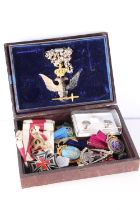 Masonic jewels to include a rose croix jewel in the form black and white eagle holing sword with