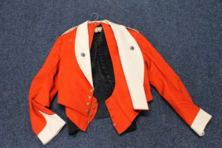 British Army Mess Dress red jacket with matching waistcoat bearing insignia of East Surrey Regiment.