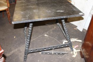 Arts and Crafts square topped side table, raised on ring turn supports united by under stretchers