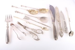 Silver plated flatware to include a pair of serving spoons, carvers, grape scissors, Two George VI