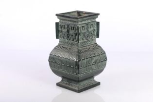 Oriental green cast bronzed metal vase, 16cm high.