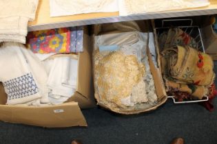 Tapestry embroideries, fringed tassel cuttings and two boxes of fabrics, linens, quilts, etc.