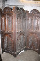 Early 20th century carved oak three panel folding dressing screen, 155cm high.