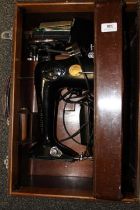 Singer sewing machine in original case.