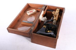 Students microscope in original mahogany case.
