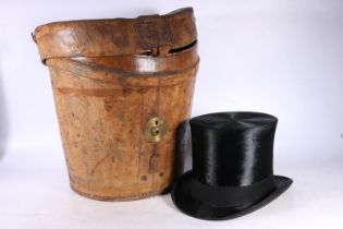 Lincoln Bennett & Co. of London top hat in large leather carrying box.
