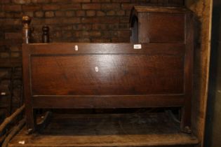 19th century elm and oak rocking crib with hooded canopy, 92cm long.