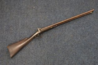 19th century side by side percussion cap muzzle loading shotgun, the stock with white metal fittings