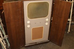 Vintage Phillips cabinet radio in mahogany case, 60cm wide.