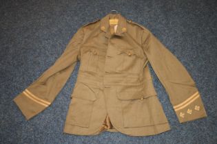 British army green khaki jacket having Royal Scots brass buttons and collar buttons and lower sleeve