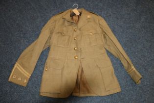 British army green khaki jacket having Royal Scots brass buttons and collar buttons and lower sleeve
