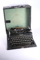 Imperial EER Model T typewriter in original carrying case.