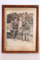 Royalty interest, a framed photograph of Queen Elizabeth, Prince Philip and children, signed to