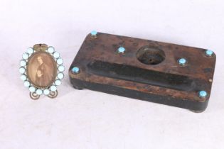 Antique wooden deskstand inset with six turquoise cabochons, 19cm long, and a small easel frame