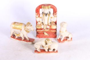 Indian painted soapstone figure 16cm tall and three matching animal models. (4)
