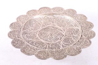 Eastern white metal bowl of lobed circular form with all over filigree decoration, 20cm diameter.