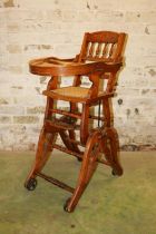 Edwardian carved mahogany high chair, with bergere seat, 95cm high.