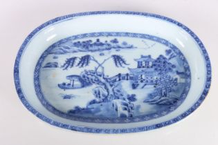 Chinese blue and white oval dish decorated with pavilion scene, 25cm long.