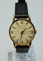 Gent's Smith's Astral watch, 9ct gold, 1963, manual, 31mm, on strap.