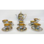 Carlton Ware 'Paradise Bird' pattern coffee set depicting a flying bird in colourful enamels in a