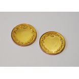 Pair of 9ct gold medals, uninscribed, 18g.