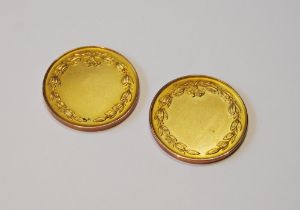 Pair of 9ct gold medals, uninscribed, 18g.