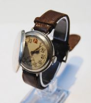 Silver hunter wristwatch of trench style, 'red twelve', '800', stamped 'Brevet' to the inner casing,