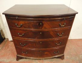 George III style mahogany bachelor's chest of four long drawers, with brushing slide, on splayed