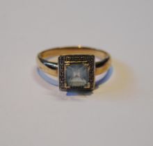 Aquamarine and diamond square cluster ring in 9ct gold, size T, 3.7g gross.