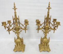 Pair of antique continental gilt candelabra in the Renaissance style, probably formerly from a clock