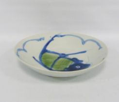 Japanese export circular dish (Meiji period 1868 - 1912) painted in blue and green with a carp to