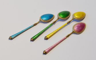 Set of four Norwegian silver coffee spoons with harlequin enamel.