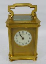 Brass and gilt four glass carriage clock with movement viewing window to the top, inscribed to the