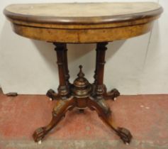 Victorian figured walnut D-end card table opening to reveal a later baize-lined surface, on