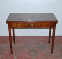 Georgian mahogany tea table, circa early 19th century, with fold over top above a short drawer, on