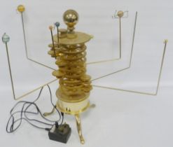 Replica gilt metal revolving planet orrery in the form of the solar system, fitted for