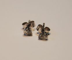 Pair of diamond ear studs, each a pear-shaped brilliant, 18ct white gold, 5mm.
